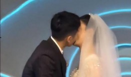 新郎亲吻新娘视频,新郎深情亲吻新娘，浪漫婚礼画面引网友热议